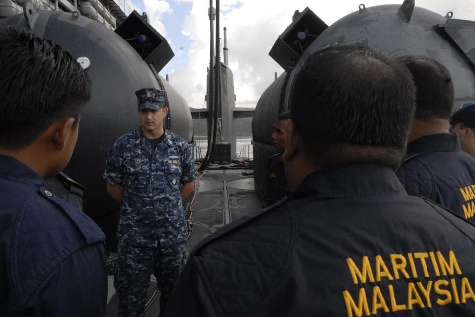 sailors aboard the guided-missile submarine USS Ohio