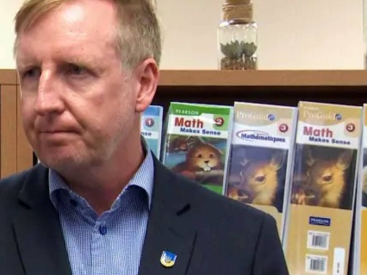 Dominic Cardy, former minister of education for New Brunswick, said he's glad to see what he calls 'a slightly embarrassing chapter' concluded. (CBC - image credit)