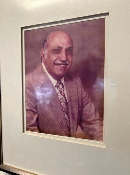 A photo of founder Andy Zamarelli hangs inside Zamarelli's Pizza Palace in Grove City. Zamarelli opened the restaurant in 1963 using recipes his mother brought from Italy. It's owned today by his daughter and son-in-law, Tina and Jack Middendorf.