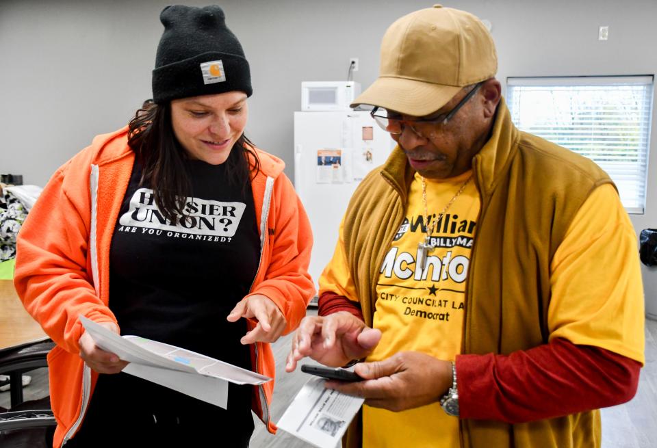 At the Laborers Local 1112 union hall, UnoBlessed, executive director of the Indiana AFL-CIO, shows Muncie City Council candidate William McIntosh how to navigate the canvassing route of UAW households on Saturday, Oct. 28, 2023.