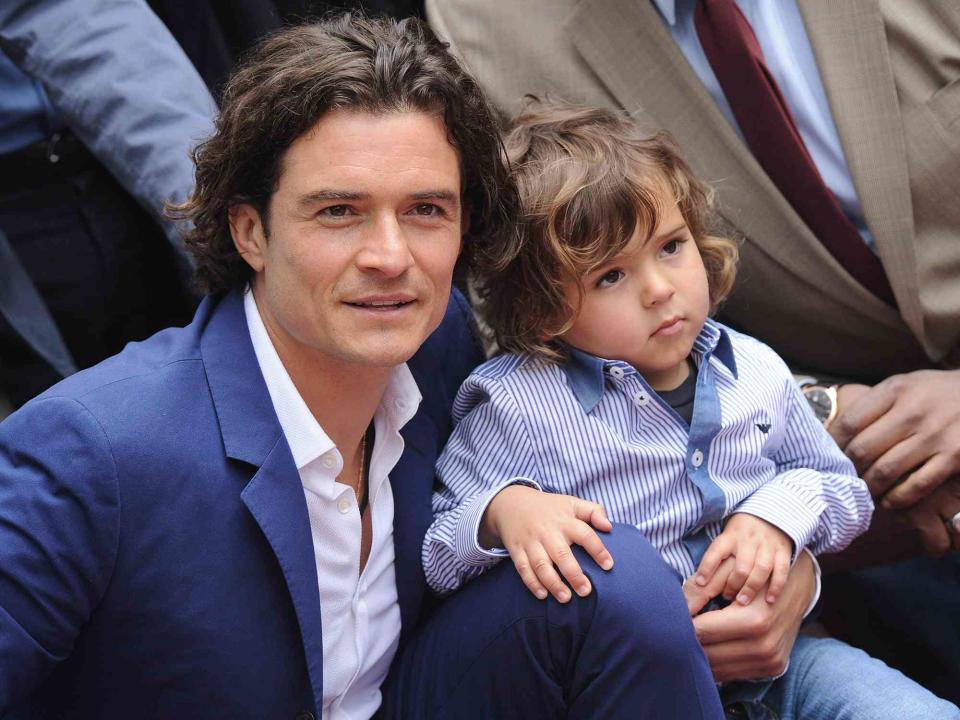 <p>Axelle/Bauer-Griffin/FilmMagic</p> Orlando Bloom and his son Flynn Bloom attend the ceremony honoring Orlando Bloom with a Star on The Hollywood Walk of Fame on April 2, 2014 in Hollywood, California.