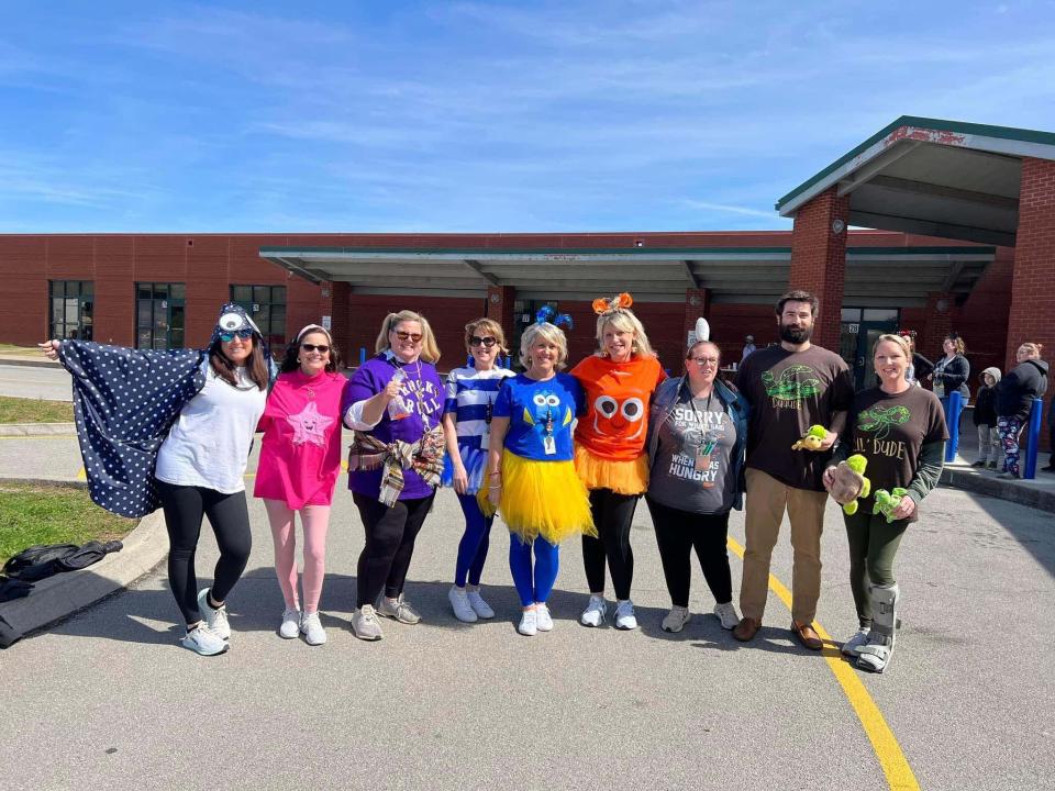 Fifth grade teachers dress in bright colors to celebrate the day at the annual Hawk Walk at Hardin Valley Elementary School March 10, 2023.