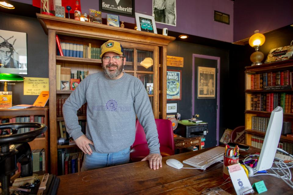 Dave Pedersen, the owner of Maze Books, poses for a photo on Thursday, Nov. 10, 2022, in Rockford.