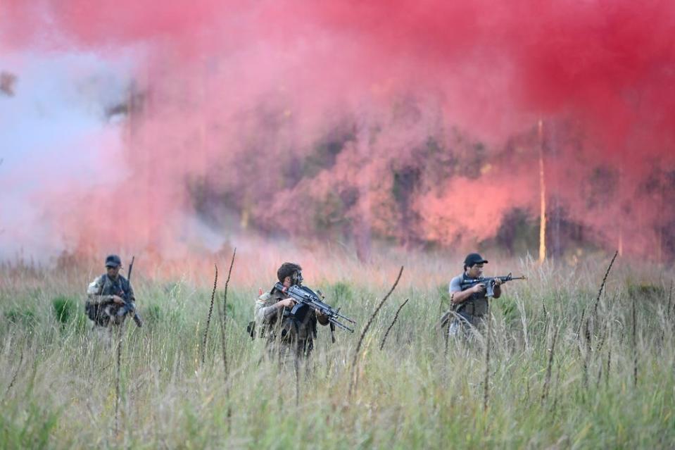 Special Forces candidates assigned to the U.S. Army John F. Kennedy Special Warfare Center and School assault enemy role players as they take part in the final phase of field training known as Robin Sage in central North Carolina, Sept. 28, 2021. The exercise for soldiers in the Special Forces qualification course will be held again from Jan. 22, 2022, to Feb. 4, 2022, across 25 North Carolina counties.