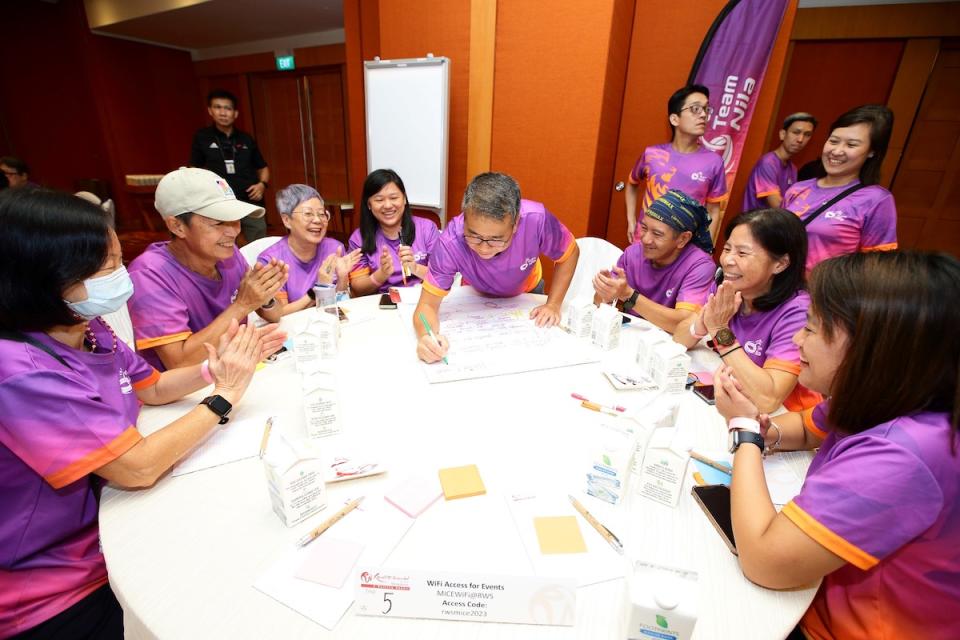 Minister for Culture, Community and Youth Edwin Tong (centre) joins a group of volunteer leaders to discuss on how to advance sport volunteerism in Singapore. (PHOTO: MCCY)