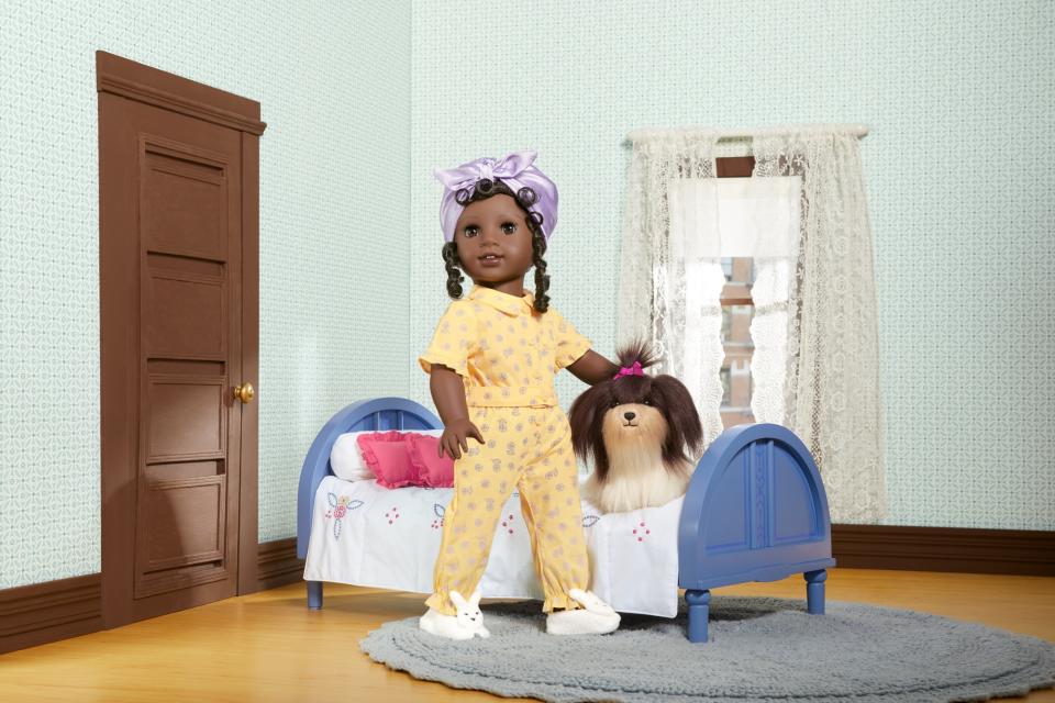 Claudie's pet dog is among the accessories available to purchase. (Photo: American Girl)