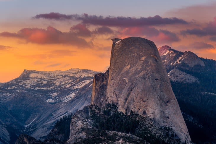 View of Half Dome, with its flat face, from Sentinel Dome in Yosemite