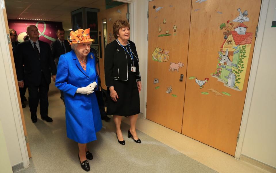 The Queen walks through a ward at Royal Manchester Children's Hospital - Credit: Peter Byrne/PA