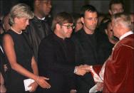 <p>Both Princess Di and Elton John kept things simple for Gianni Versace's memorial service. The musician wore no accessories besides a watch and minimalistic stud earrings. </p>