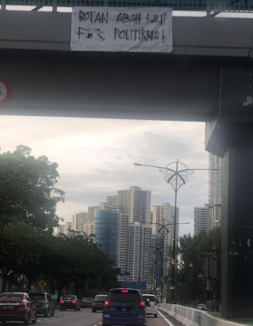 A picture of the banner with vulgar insults along the Danga Bay stretch in Johor Baru October 7, 2020. — Picture from Facebook