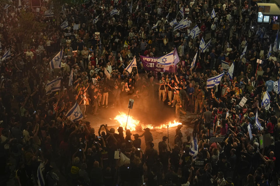 Relatives and supporters of the Israeli hostages held in the Gaza Strip by the Hamas militant group call for their release during a protest in Tel Aviv, Monday, April 29, 2024. (AP Photo/Ohad Zwigenberg)