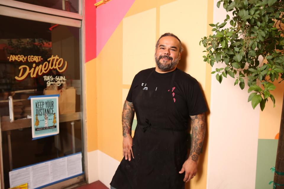 Wes Avila stands in front of his Angry Egret Dinette, which opened in Chinatown in October.