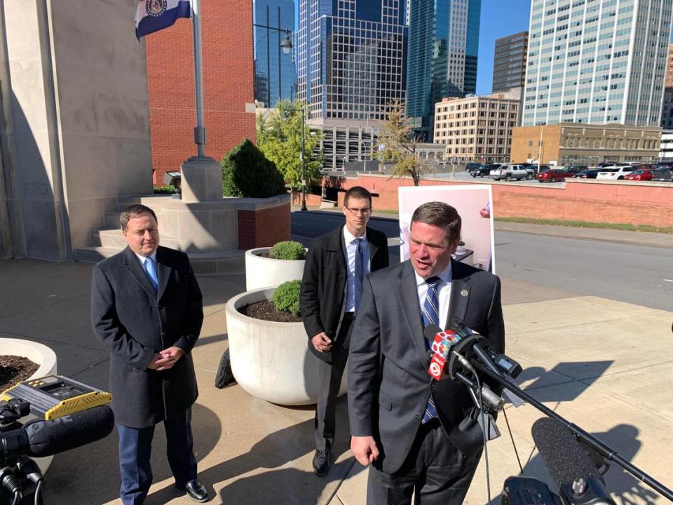 Missouri Attorney General Andrew Bailey speaks to reporters on Monday, October 30, 2023, in Kansas City as Missouri Secretary of State Jay Ashcroft, left, watches.