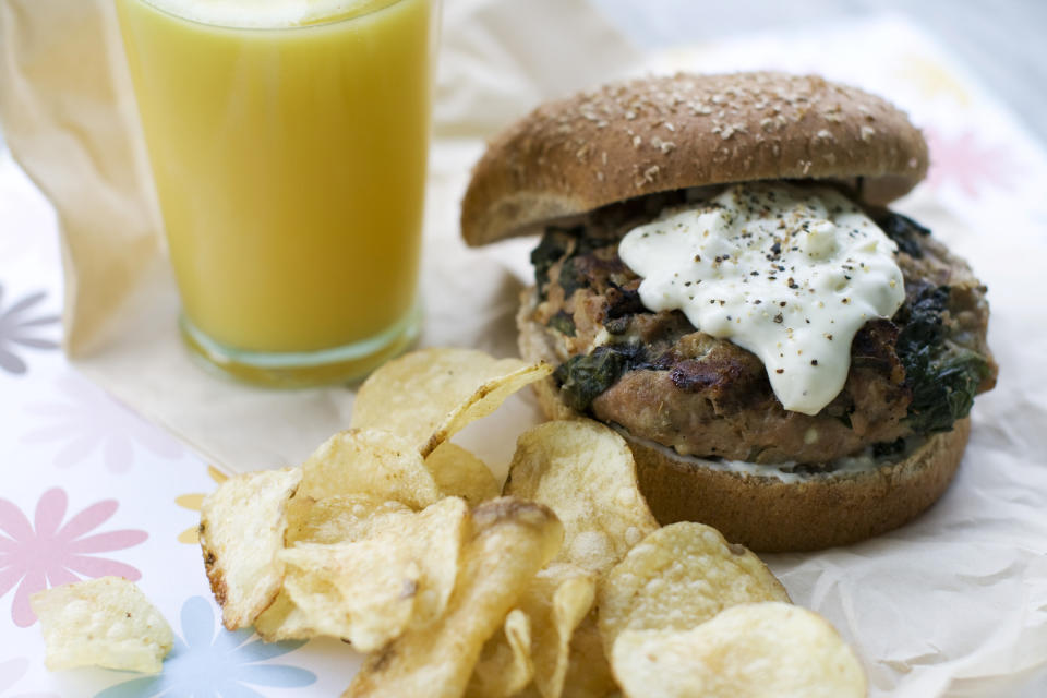 In this image taken on May 20, 2013, a Greek-style turkey burger with pepperoncini sauce is shown in Concord, N.H. (AP Photo/Matthew Mead)