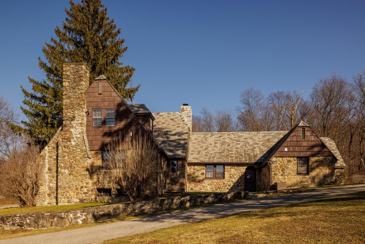 The gatehouse and one of three guesthouses on the Willow Lake Farm property, located at 4 Willow Lake Drive.