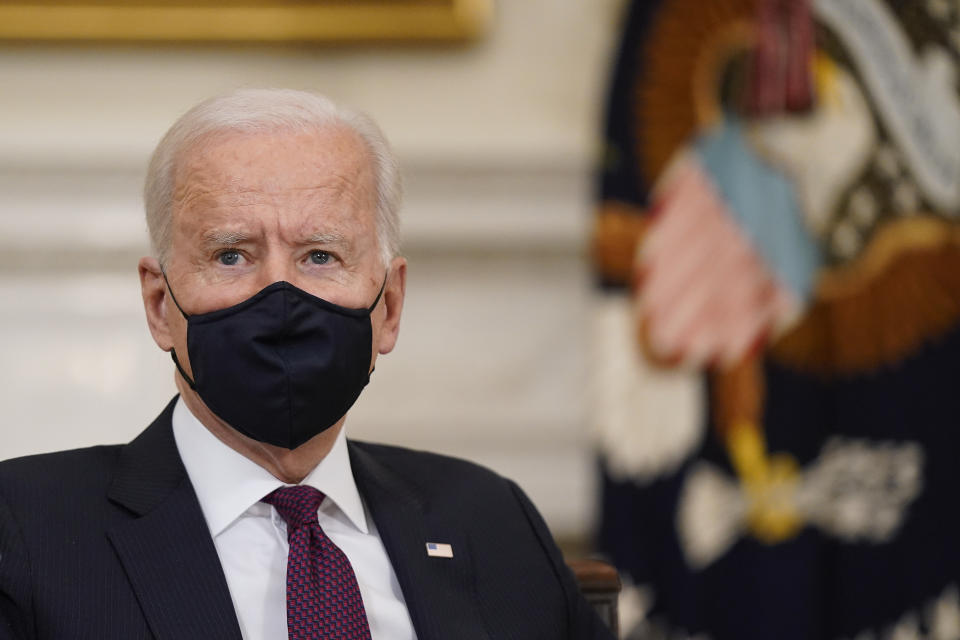 President Joe Biden participates in a roundtable discussion on a coronavirus relief package in the State Dining Room of the White House in Washington, Friday, March 5, 2021. (AP Photo/Patrick Semansky)