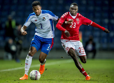 Soccer - International Friendly - Denmark vs Panama - Broendby stadium, Copenhagen, Denmark - March 22, 2018. Panama's Michael Murillo and Denmark's Pione Sisto are seen in action. Ritzau Scanpix/Mads Claus Rasmussen via REUTERS