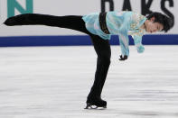 Yuzuru Hanyu of Japan performs during the men's free skating competition of the Japan Figure Skating Championships at Saitama Super Arena, in Saitama, north of Tokyo, Sunday, Dec. 26, 2021. (AP Photo/Eugene Hoshiko)