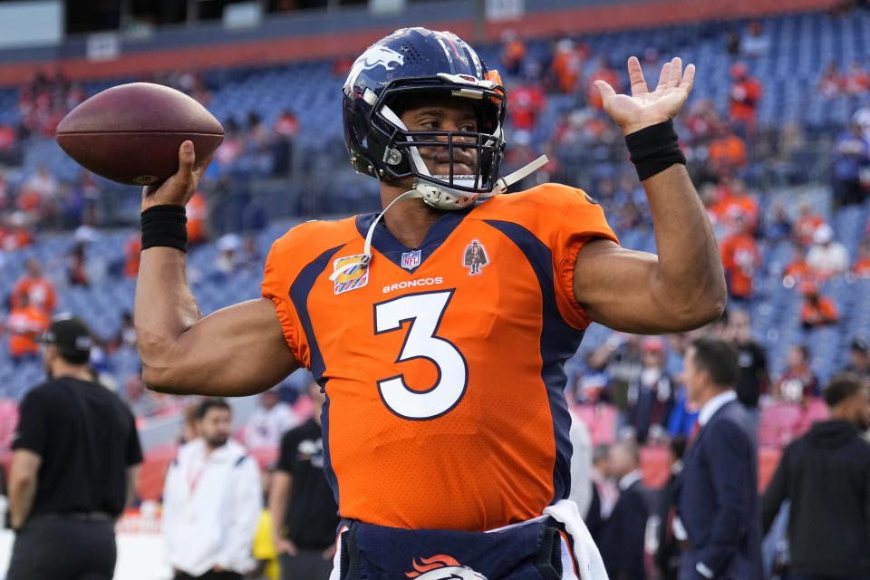 Denver Broncos quarterback Russell Wilson (3) warms up prior to an NFL football game against the Indianapolis Colts, Thursday, Oct. 6, 2022, in Denver. (AP Photo/Jack Dempsey)