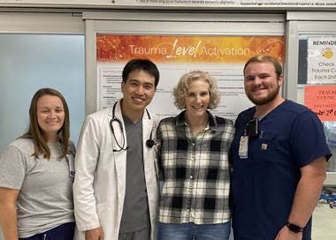 Julie Koehler and her care team from Piedmont Walton in Monroe, Georgia. Koehler in August 2023 survived a rare heart condition that nearly took her life.