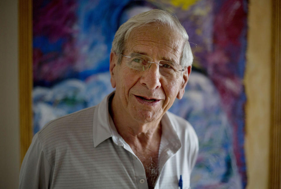 FILE - Israeli actor Chaim Topol speaks during an interview in Tel Aviv, Israel, on April 8, 2015. Chaim Topol, a leading Israeli actor who charmed generations of theatergoers and movie-watchers with his portrayal of Tevye, the long-suffering and charismatic milkman in “Fiddler on the Roof,” has died in Tel Aviv, Israeli leaders said Thursday, March 9, 2023. He was 87. (AP Photo/Ariel Schalit, File)