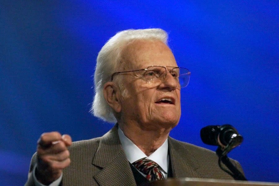 FILE – The Rev. Billy Graham addresses a gathering of about 40,000 people at Bulldog Stadium at Fresno State University in Fresno, Calif., Thursday, Oct. 11, 2001. A statue of the late Rev. Billy Graham set to stand inside the U.S. Capitol to represent North Carolina will be unveiled next week in a ceremony. (Mark Crosse/The Fresno Bee via AP, File)