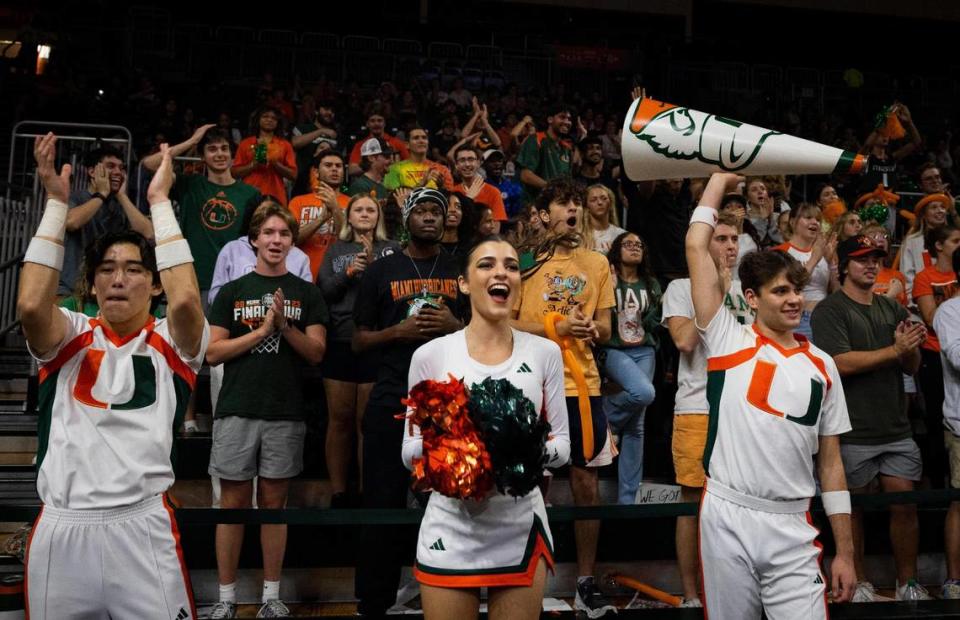 The student section and cheer leaders celebrate a basket during the second half of Miami Hurricanes home opener against NJIT on Monday, Nov. 6, 2023, at the Watsco Center in Coral Gables. The Hurricanes won 101-60.
