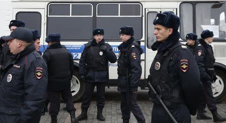 Policemen gather in the case of an anti-government protest, which was not sanctioned by the authorities, in central Moscow, Russia, April 2, 2017. REUTERS/Maxim Shemetov