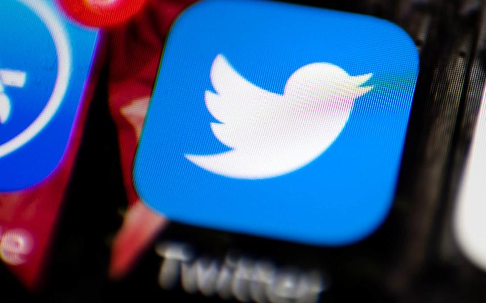 Twitter has admitted that users' security email and phone numbers were used to target them with advertising - AP