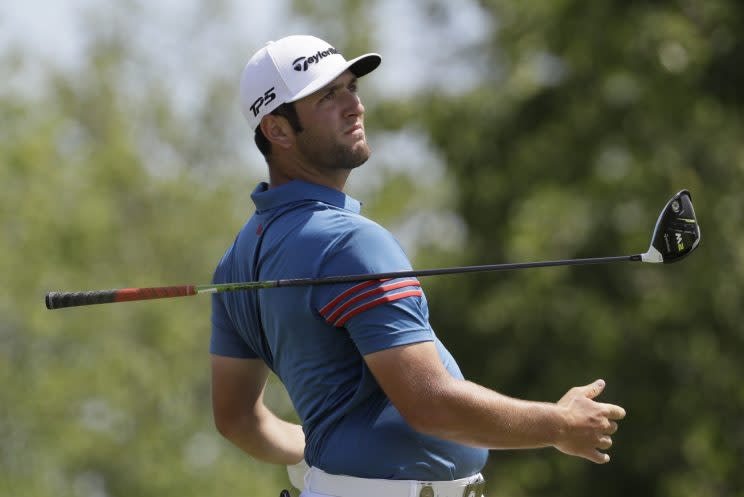 Jon Rahm lets go of his driver on the fourth hole. (AP)