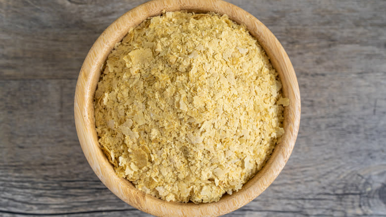 nutritional yeast in wooden bowl 