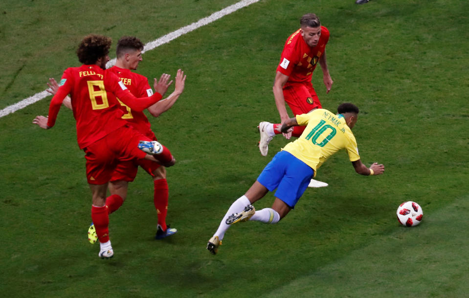 <p>Neymar dives in the box, but escapes a yellow card which would have suspended him for the semi finals </p>