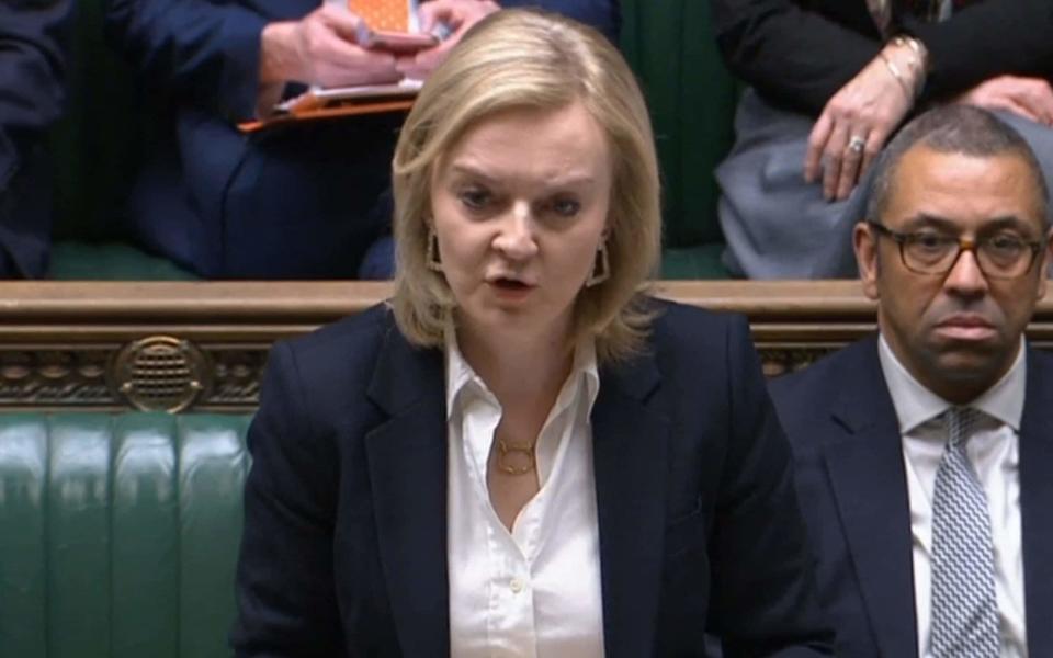 Liz Truss is addressing MPs in the Commons as she sets out new sanctions - -/AFP via Getty Images