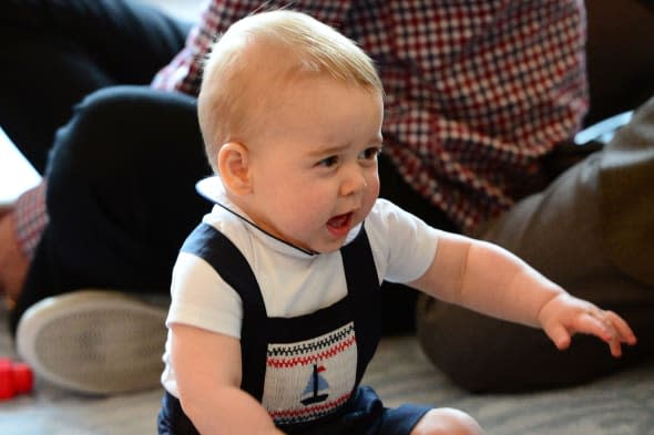 Prince George plays with toys as the Duke and Duchess of Cambridge and Prince George visit Plunket, a child welfare group at Government House, Wellington, during their official tour to New Zealand.   PRESS ASSOCIATION Photo. Picture date: Friday March 14, 2014. See PA story ROYAL Tour. Photo credit should read: Anthony Devlin/PA Wire