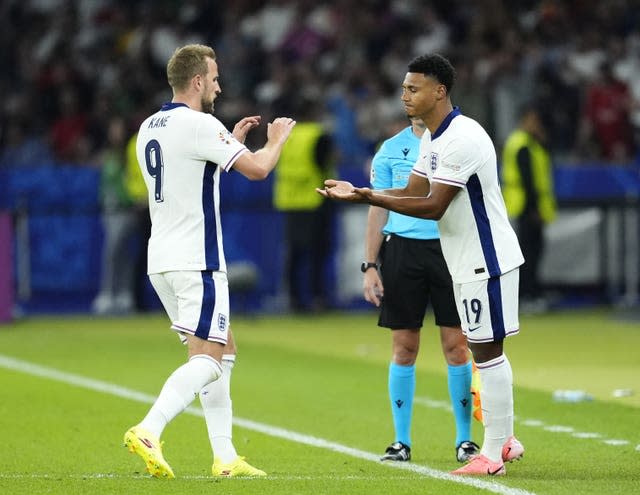 Harry Kane encourages Ollie Watkins as the Aston Villa man replaces him