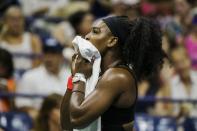 Serena Williams of the U.S. wipes down during her match against Vitalia Diatchenko of Russia at the U.S. Open Championships tennis tournament in New York, August 31, 2015. REUTERS/Lucas Jackson