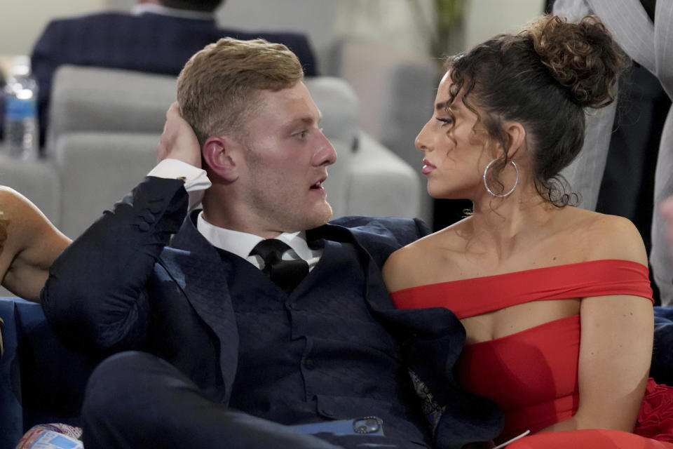 Kentucky quarterback Will Levis waits in the green room with girlfriend Gia Duddy at the NFL Draft. It was a long wait. (AP Photo/Doug Benc)