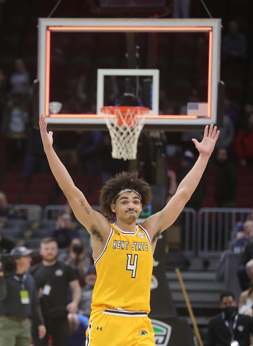 Kent State's Chris Payton celebrates defeating Akron in a MAC semifinal March 10, 2023, in Cleveland.