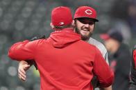 Cincinnati Reds starting pitcher Wade Miley, right, is congratulated by a teammate after piching a no-hitter in a baseball game against the Cleveland Indians, Friday, May 7, 2021, in Cleveland. (AP Photo/Tony Dejak)