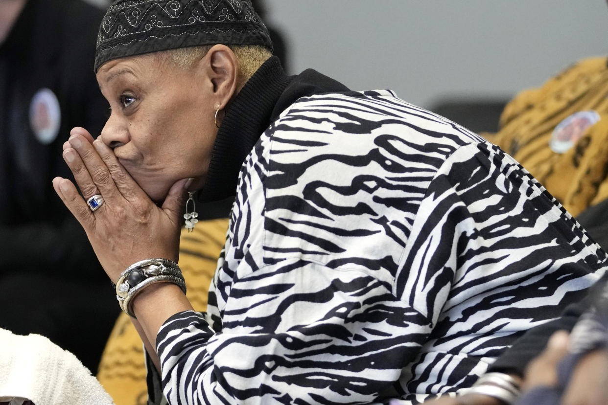 A member of the audience listens intently to Chicago mayor Lori Lightfoot's campaign speech during a Women for Lori Rally in Chicago, Saturday, Feb. 25, 2023. Lightfoot is fighting for reelection Tuesday after a history-making but tumultuous four years in office and a bruising campaign threaten to make her the city's first one-term mayor in decades. (AP Photo/Nam Y. Huh)