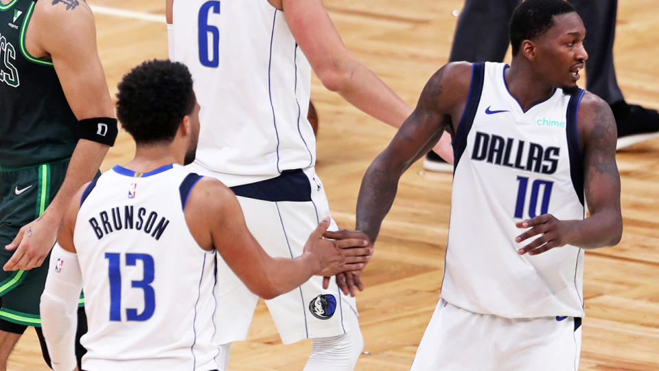 Jalen Brunson and Dorian Finney-Smith, pictured here in action for the Dallas Mavericks.
