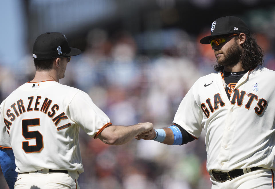 Mike Yastrzemski and Brandon Crawford of the San Francisco Giants celebrate a win. (Photo by Thearon W. Henderson/Getty Images)