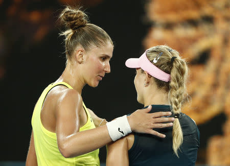 Tennis - Australian Open - Second Round - Melbourne Park, Melbourne, Australia, January 16, 2019. Brazil’s Beatriz Haddad Maia and Germany’s Angelique Kerber talk after the match. REUTERS/Edgar Su