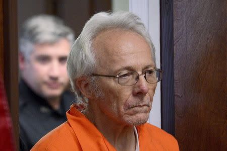 Bruce Leonard enters the courtroom to stand for a manslaughter charge against him in the death of his 19-year-old son Lucas Leonard, in New Hartford, New York in this October 16, 2015 file photo. REUTERS/Tina Russell/Observer-Dispatch/Pool/Files