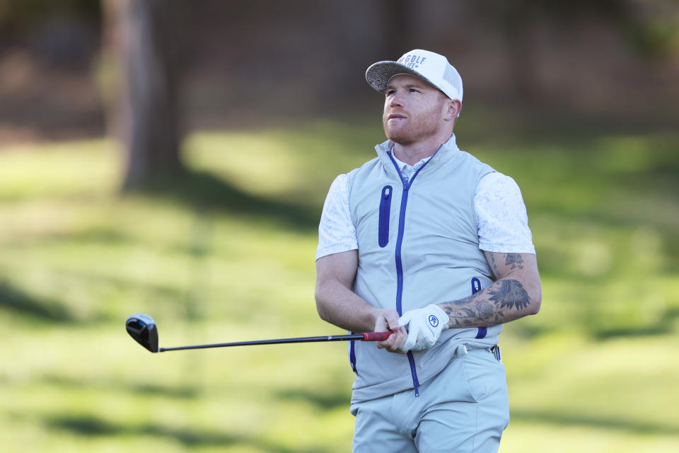 PEBBLE BEACH, CALIFORNIA - FEBRUARY 04: Boxer Canelo Alvarez plays his shot from the 11th tee during the second round of the AT&T Pebble Beach Pro-Am at Spyglass Hill Golf Course on February 04, 2022 in Pebble Beach, California. (Photo by Jed Jacobsohn/Getty Images)
