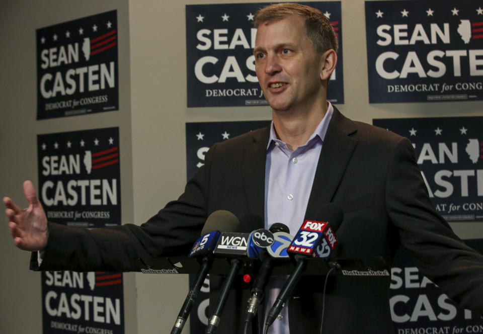 FILE - In this Nov. 7, 2018 file photo, Illinois Sixth Congressional District winner Sean Casten takes questions at a press conference in Downers Grove, Ill., about his win in the Nov. 6, 2018 general election. Illinois Democrats did what was once unthinkable when they flipped two suburban Chicago congressional districts that had been held by Republicans pretty much since World War II. Casten defeated six-term Republican Rep. Peter Roskam by more than five percentage points. (Bev Horne/Daily Herald via AP)/Daily Herald via AP)