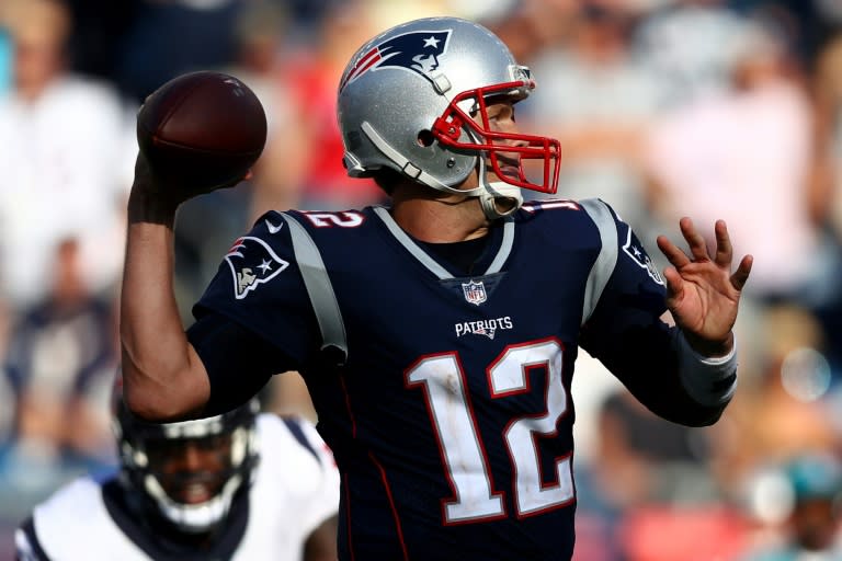 Tom Brady of the New England Patriots makes a pass against the Houston Texans, at Gillette Stadium in Foxboro, Massachusetts, on September 24, 2017