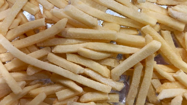 Frozen fries on foil 