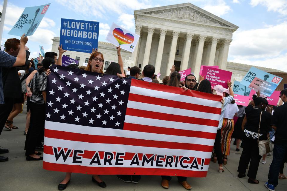 <p>People protest the Muslim travel ban outside of the US Supreme Court in Washington, D.C. on June 26, 2018. (Photo: Mandel Ngan/AFP/Getty Images) </p>