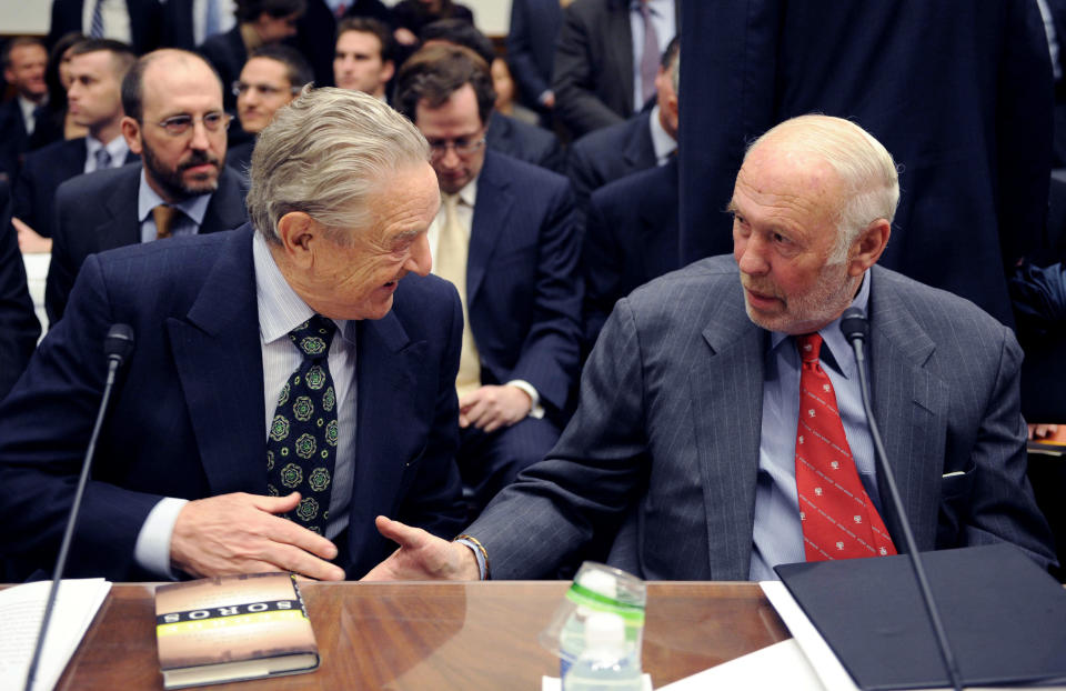 Soros Fund Management chairman George Soros, left, shakes hands with Renaissance Technologies then-president James Simons on Capitol Hill in 2008, prior to a committee hearing on hedge funds. (Photo: Kevin Wolf/AP)